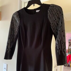 Fitted Calvin Klein dress size fits 2-4.